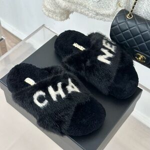 CHANEL Black Faux-Fur Logo Slide Slippers with White Embroidery